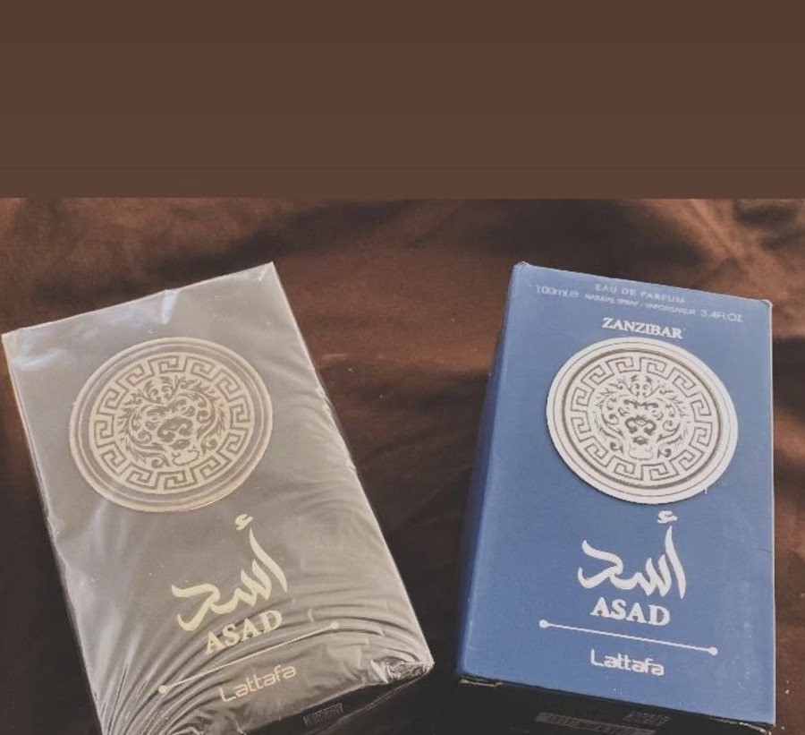 Cajas de los perfumes ASAD y ZANZIBAR de Lattafa